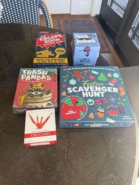 Bundle of five games, all unopened or never used